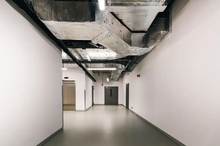 Exposed duct runs above a ceiling, where leaks in Rio Linda homes go unnoticed for years
